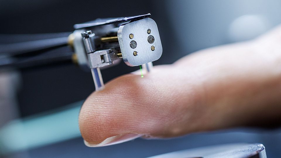 Miniature Robot for Minimally Invasive Laserosteotomy